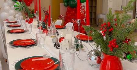 warm neutral indoor party space in Fairfax VA decorated for a kids Christmas birthday party